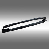 NexaNovo gloss black side skirt under spoilers installed on a 2023 BMW XM G09