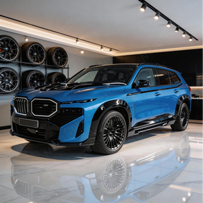 Full side-view perspective of a 2025 BMW XM featuring NexaNovo gloss black rocker extensions
