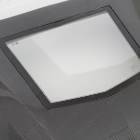 Close-up of the premium NexaNovo 3K twill real carbon fiber weave on the Cadillac CT4 hood
