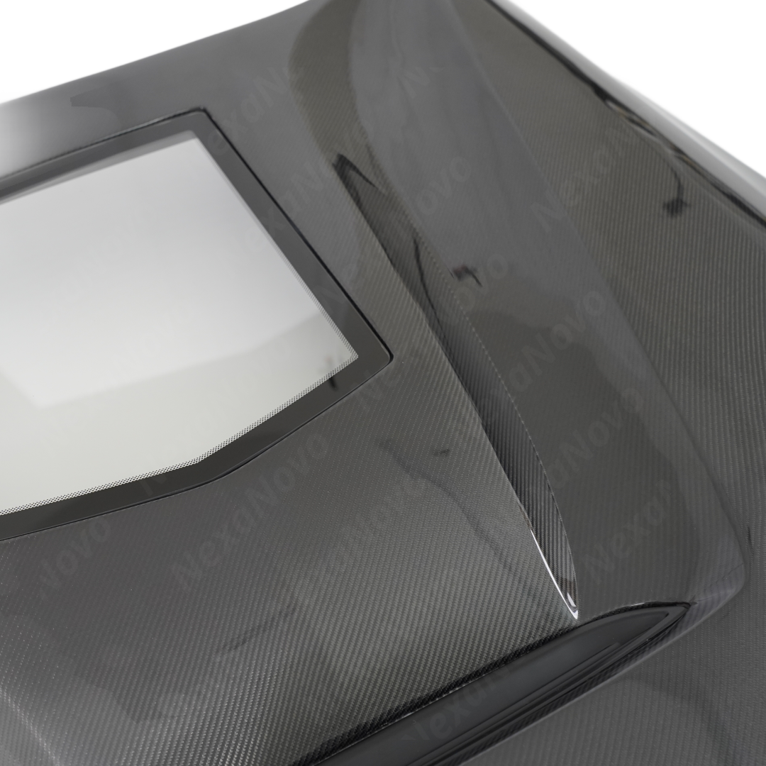Detailed shot of the UV-resistant NexaNovo high-gloss clear coat on the Cadillac carbon hood