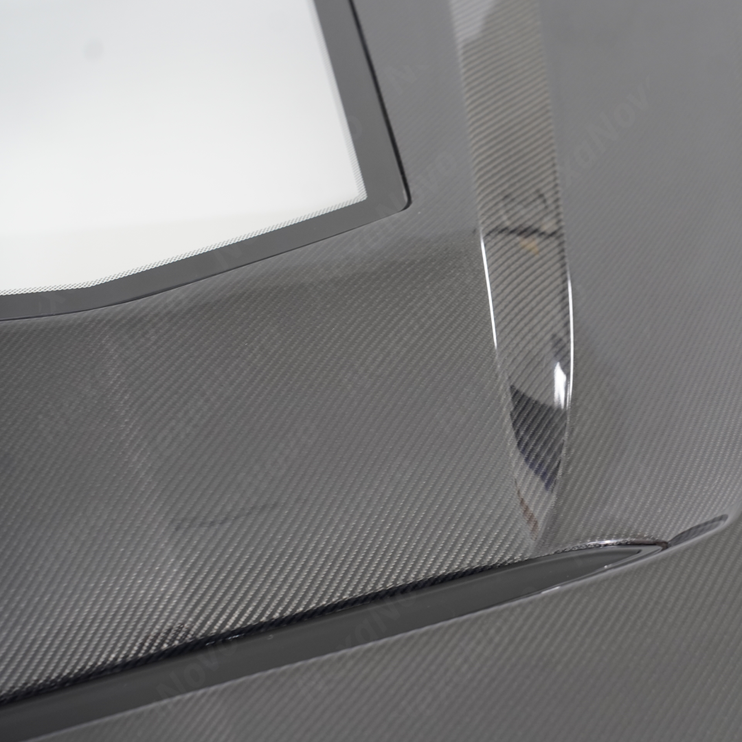 Low angle shot showing the aggressive CT style lines and aerodynamic profile of the NexaNovo hood