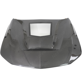 Standalone view of the uninstalled NexaNovo CT style real carbon fiber front engine hood
