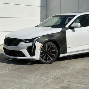 Detailed view of the integrated aerodynamic heat extraction vents on the carbon fiber CT4-V fenders