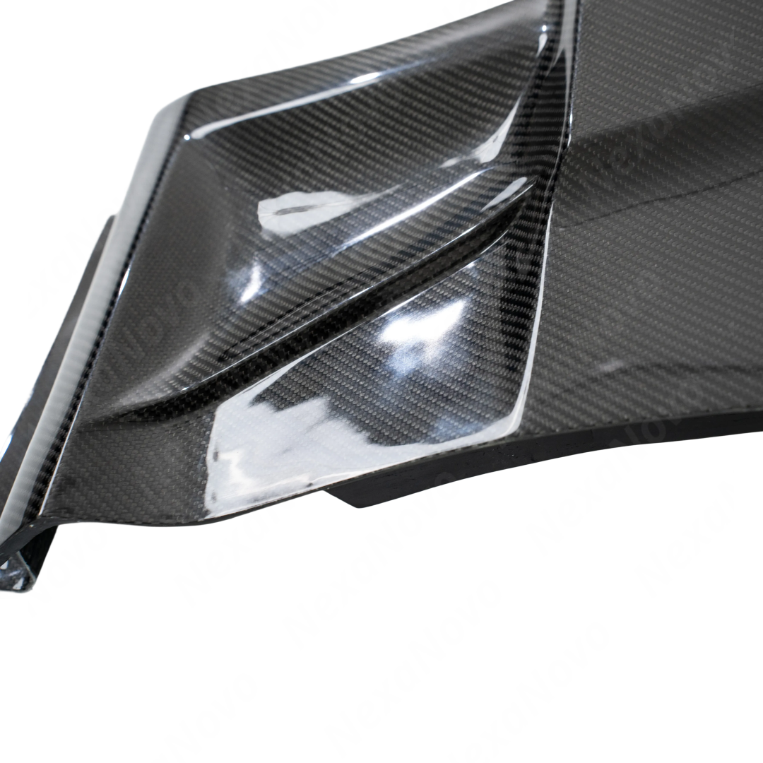 Close-up of the premium 3K twill real carbon fiber weave on the NexaNovo CT5 Blackwing side vents