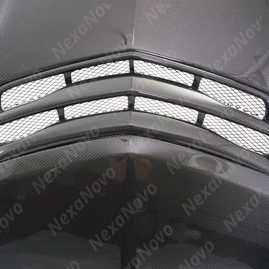 NexaNovo carbon fiber hood cover integrated on a black Cadillac CT5-V