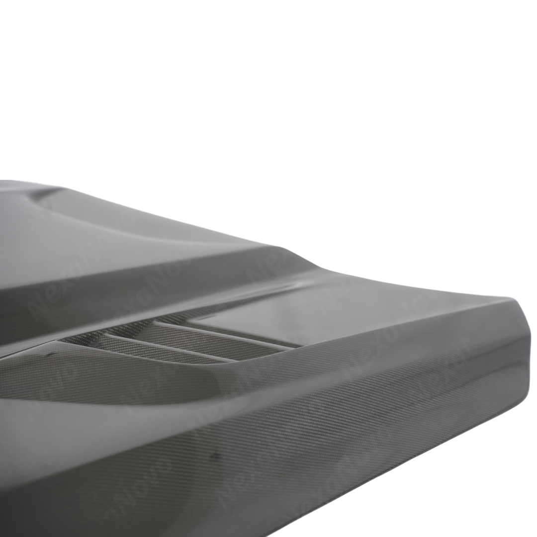 Detailed shot of the UV-resistant NexaNovo high-gloss clear coat on the Cadillac carbon hood