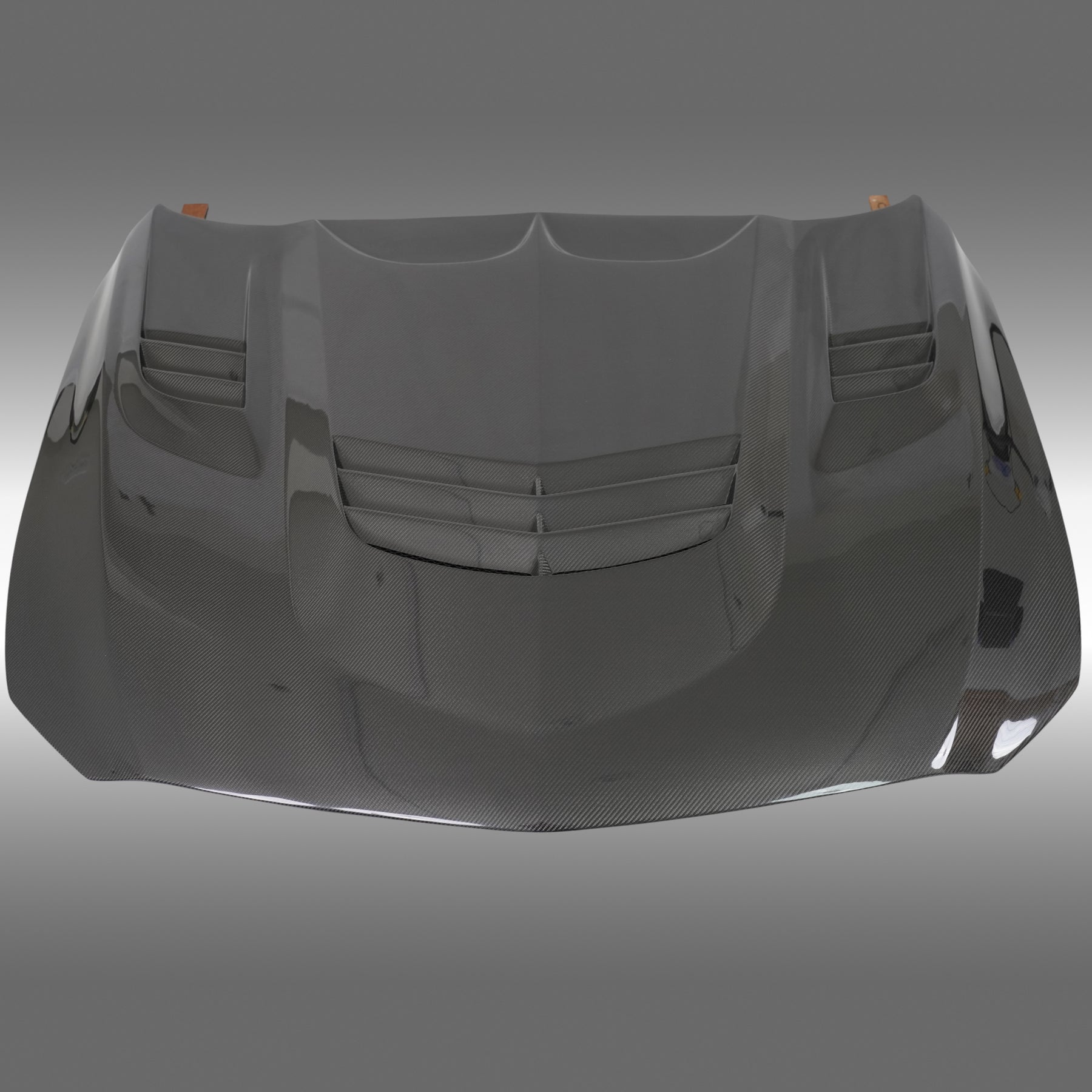 Direct front-facing view of the NexaNovo authentic carbon fiber hood for 2020-2026 Cadillac CT5