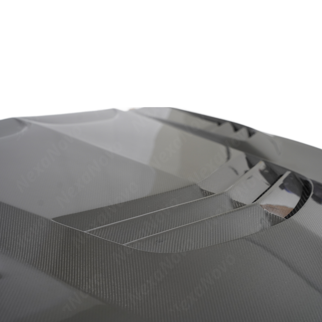 Professional studio photography highlighting the depth of the NexaNovo carbon fiber weave