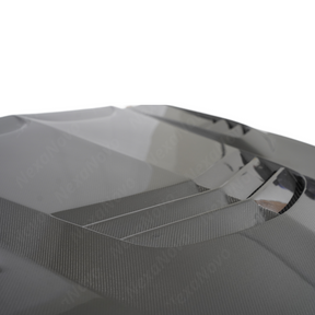 Professional studio photography highlighting the depth of the NexaNovo carbon fiber weave