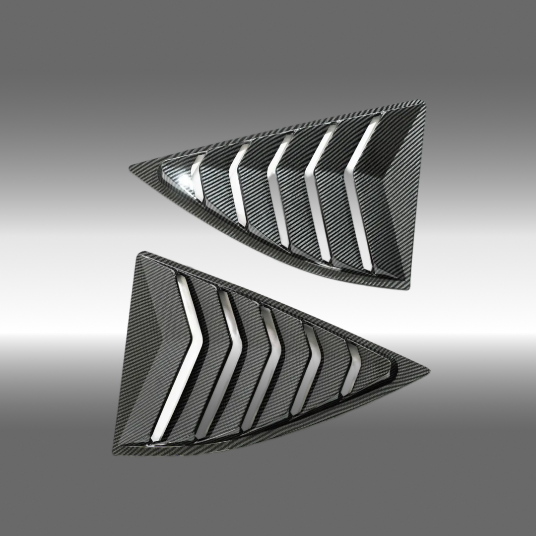 NexaNovo carbon fiber print side quarter window louver sun shade cover installed on a 2010 Chevrolet Camaro