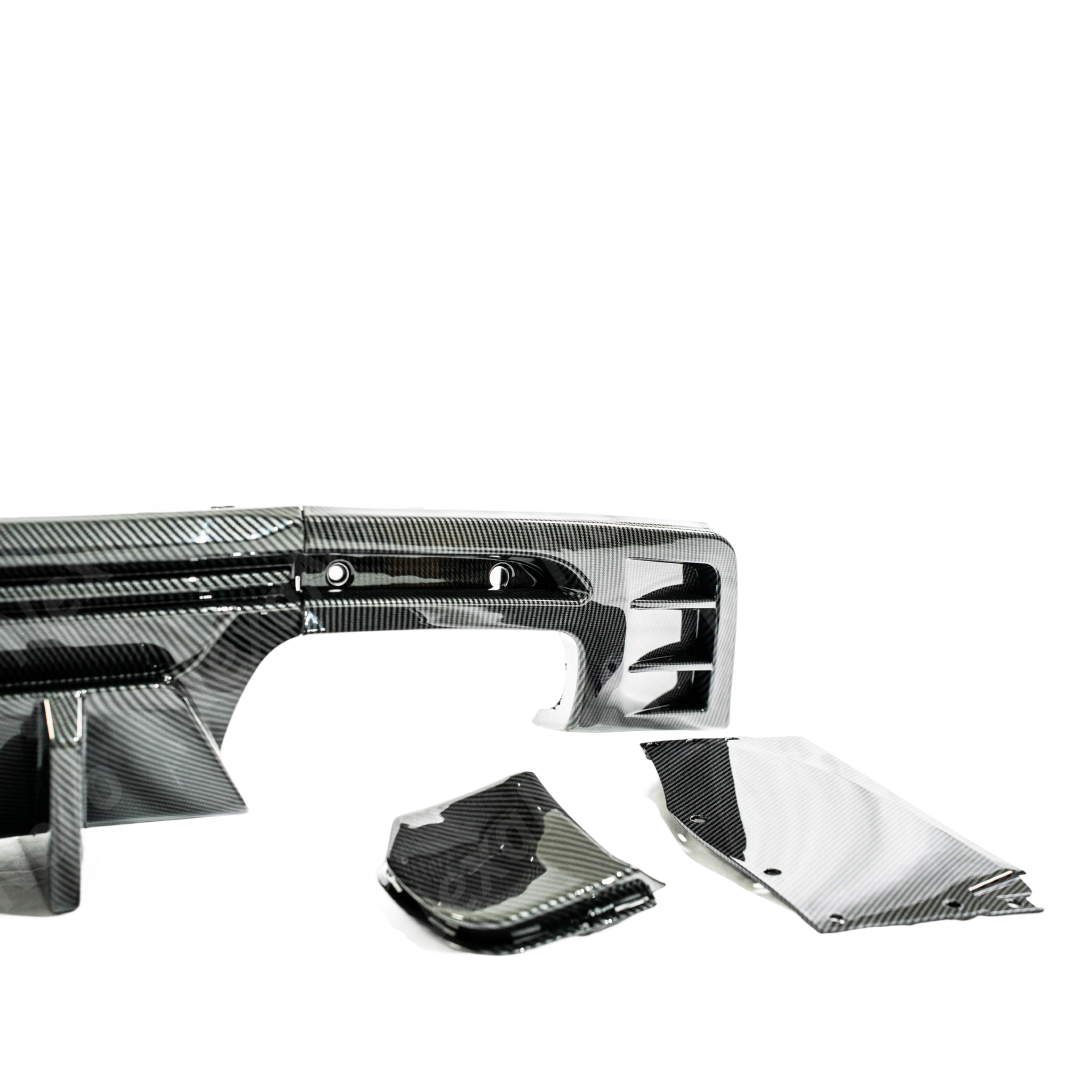 Detailed view of the NexaNovo carbon fiber pattern texture on the rear diffuser lip