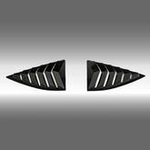 Gloss black rear window louver sunshade installed on a 2010 Chevrolet Camaro