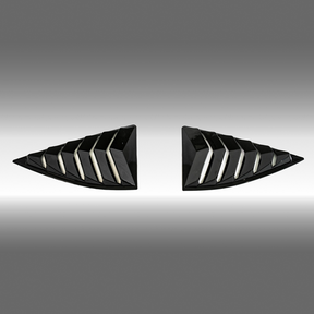 Gloss black rear window louver sunshade installed on a 2010 Chevrolet Camaro