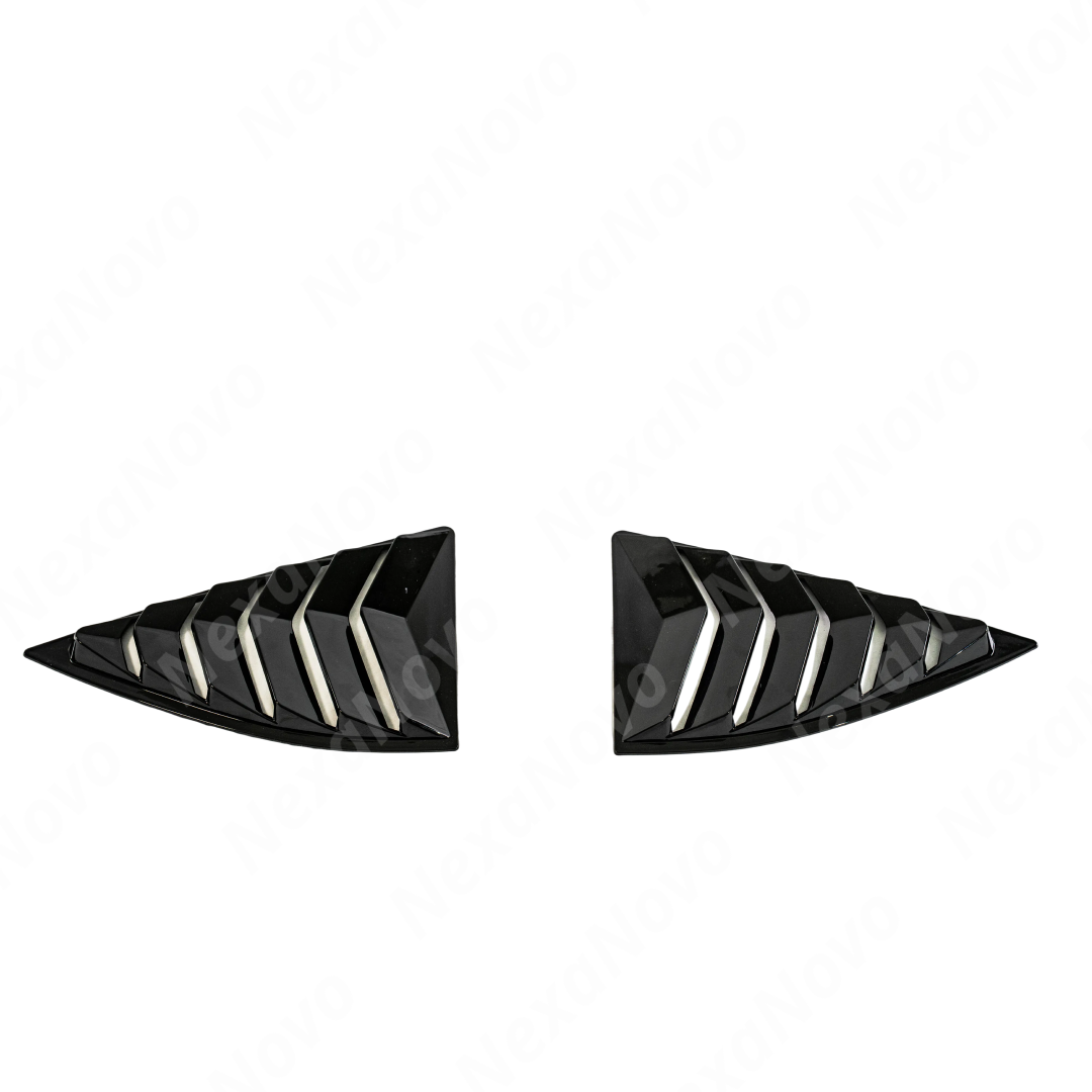 Full rear 3/4 view of a 2011 Chevrolet Camaro with the gloss black rear louver