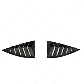 Full rear 3/4 view of a 2011 Chevrolet Camaro with the gloss black rear louver