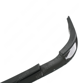 Carbon fiber car bumper on a white background