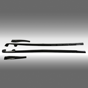 NexaNovo ZR1 style gloss black side skirt rocker panel and mud flaps installed on a 2005 Chevrolet Corvette C6