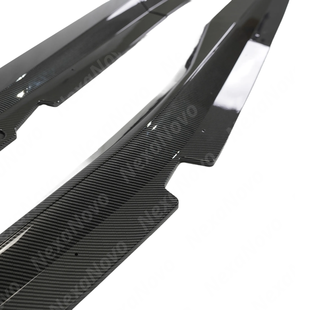 Carbon fiber car part with visible texture on a white background