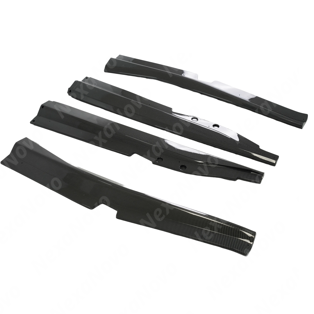 Uninstalled NexaNovo 4-piece Z06 style carbon fiber print side skirts kit laid out