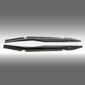 NexaNovo Z06 style gloss black side skirt extensions installed on a 2014 Chevrolet Corvette C7