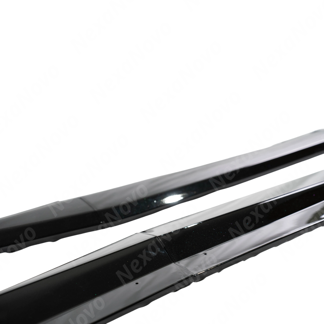 NexaNovo gloss black Z06 style side skirt extensions on a white Corvette C7