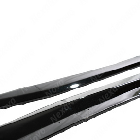 NexaNovo gloss black Z06 style side skirt extensions on a white Corvette C7