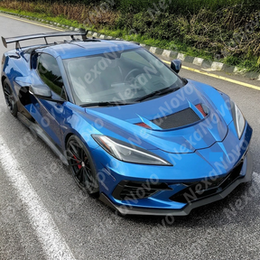 NexaNovo real carbon fiber ZR1 style hood cover on a white Corvette C8