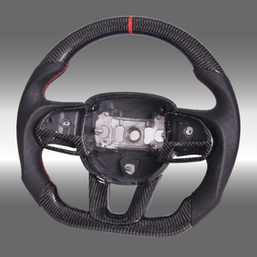 Custom 3K gloss carbon fiber sport steering wheel installed in a Dodge Challenger SRT Hellcat cockpit