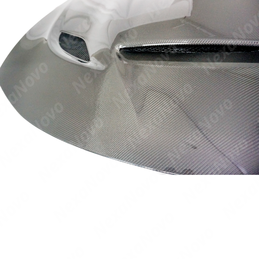 Sleek NexaNovo carbon fiber hood cover installed on a Dodge Charger
