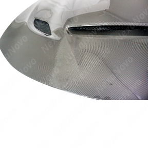 Sleek NexaNovo carbon fiber hood cover installed on a Dodge Charger