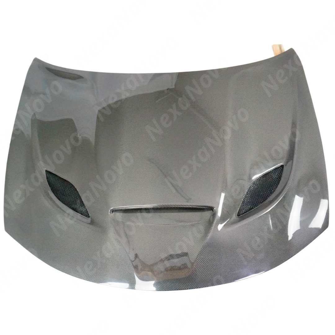 Underside view of uninstalled NexaNovo carbon fiber hood cover showing mounting points