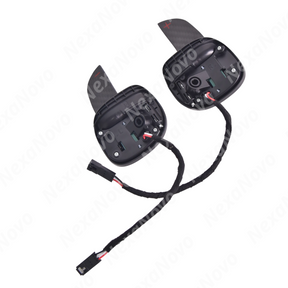 Extended carbon fiber paddle shifters accenting the flat-bottom steering wheel of a Dodge Charger SRT Hellcat
