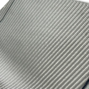 Stealth performance aesthetic of the real carbon splitter accenting a Shadow Black 2025 Mustang S650