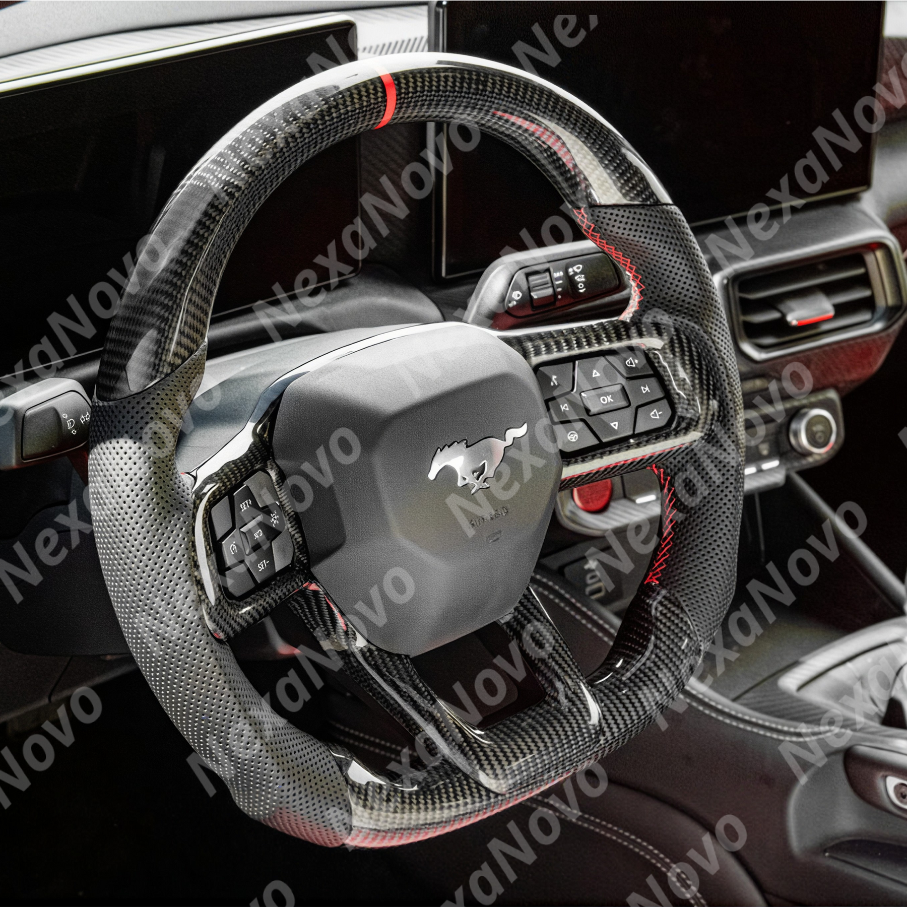 Wide-angle interior shot displaying the gloss carbon fiber wheel integrating with the modern S650 cockpit and center console