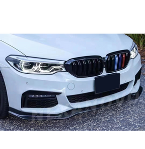 Dynamic angle showing the BMW 5 Series G30 LCI M Sport with NexaNovo Gloss Black Front Bumper Lip Spoiler, emphasizing the front spoiler lip splitter for enhanced aerodynamics.