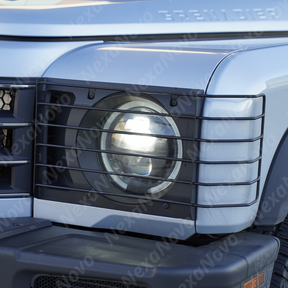 Profile shot showing the protective gap between the NexaNovo stainless steel cover and the factory headlight lens