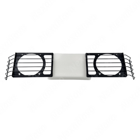Industrial NexaNovo stainless steel headlight guards providing sharp contrast on a Donny Grey INEOS Grenadier station wagon
