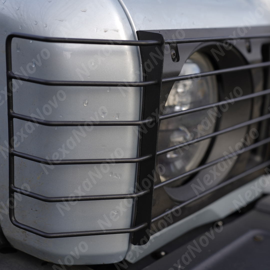 Standalone view of the driver and passenger side NexaNovo stainless steel front light cover set before assembly