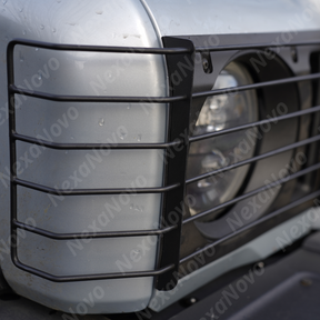 Standalone view of the driver and passenger side NexaNovo stainless steel front light cover set before assembly