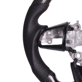 Detailed close-up of the genuine 3K twill weave gloss carbon fiber finish and UV-resistant high-clarity clear coat