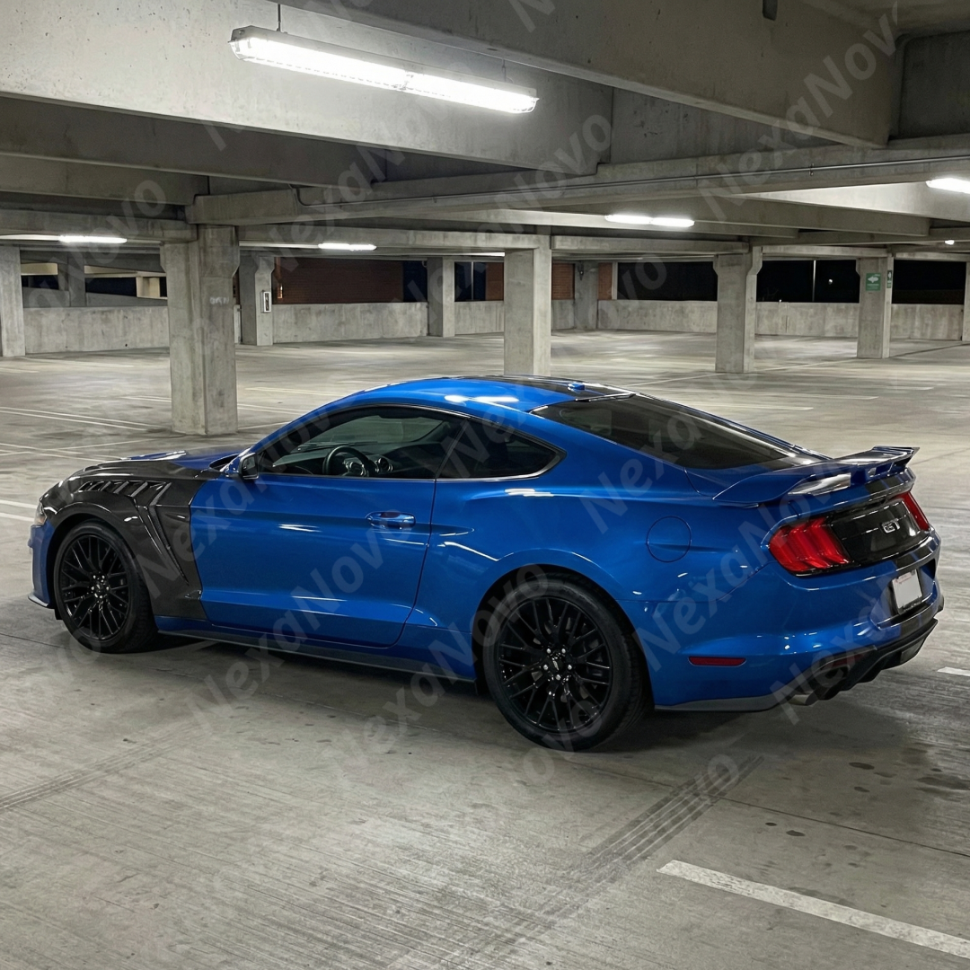 Detailed view of the functional NexaNovo aerodynamic cooling vents on the GTD style carbon fiber fenders