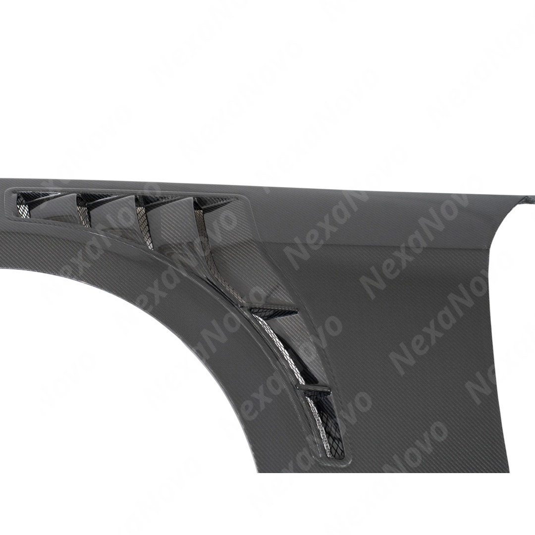 Underside of NexaNovo carbon fenders showing the vacuum-infused resin and mounting structure