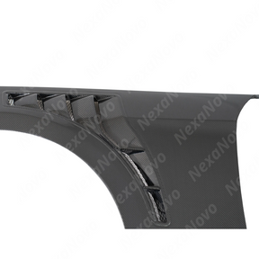 Underside of NexaNovo carbon fenders showing the vacuum-infused resin and mounting structure