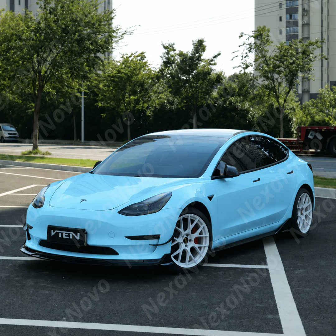 High-contrast styling of deep piano gloss black VTEN canards accenting a Pearl White Multi-Coat Tesla Model 3