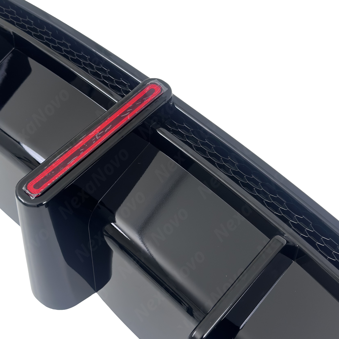 Low ground-angle perspective showing aerodynamic underbody integration and bumper valance clearance