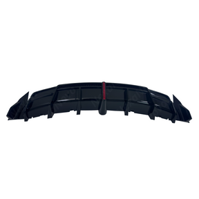 Standalone studio view of the uninstalled gloss black VTEN rear diffuser assembly with LED light and hardware kit