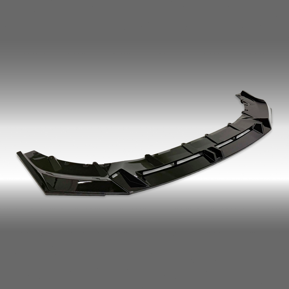 Fits BMW 530i Sedan 2024, 2025 gloss black V style front spoiler lip by NexaNovo.
