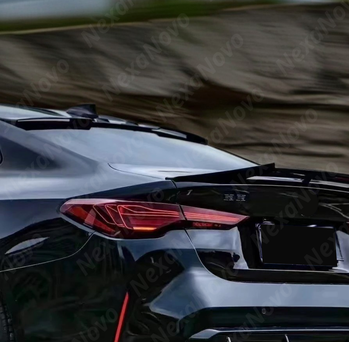 Rear roof spoiler for BMW M4 Coupe 2021-2025 in gloss black finish by NexaNovo.
