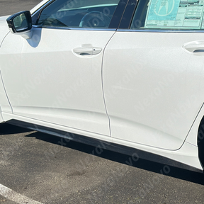 Aerodynamic carbon fiber rocker panel extension for 2024 Acura TLX by NexaNovo.
