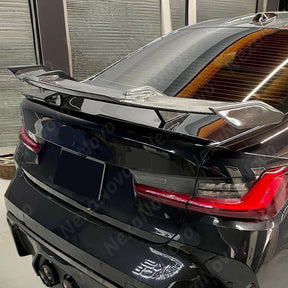 Carbon fiber rear trunk spoiler for BMW M4 2021-2025 by NexaNovo.

